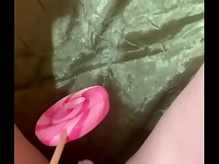 Virgin plays with candy
